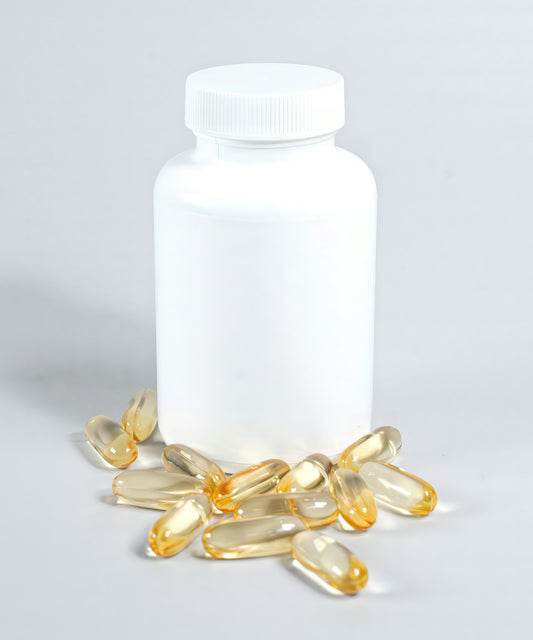 a bottle of fish oil spilling out of it
