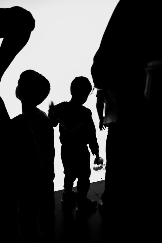 A group of people standing next to each other