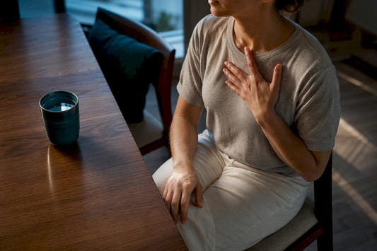 Adult experiencing physical anxiety symptoms