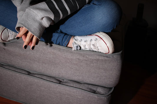 woman sitting on sofa
