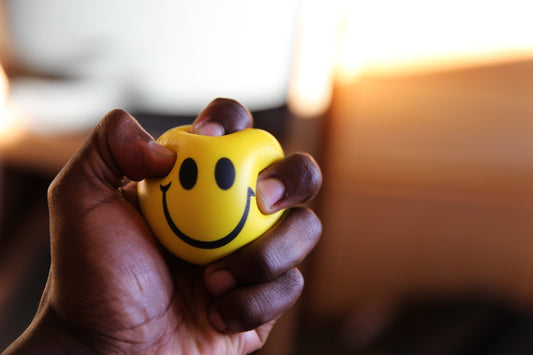 yellow emoticon plastic ball