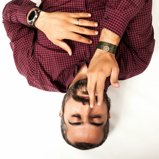 man smelling his hand