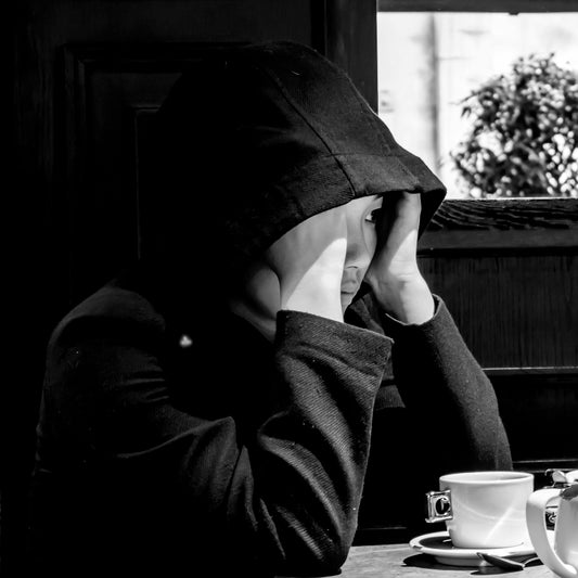 grayscale photography of woman wearing hoodie