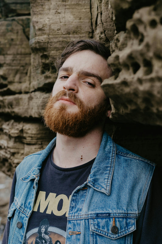 man in blue denim jacket