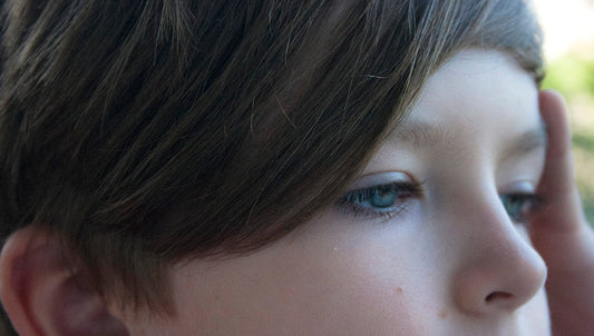woman with black hair and blue eyes