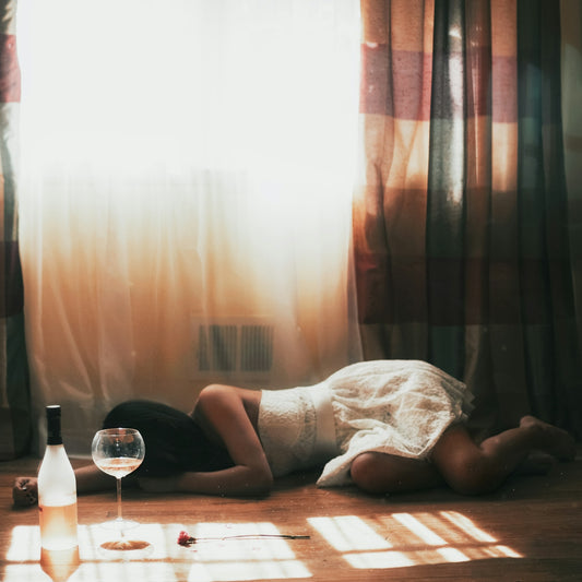 woman in white lace panty lying on bed