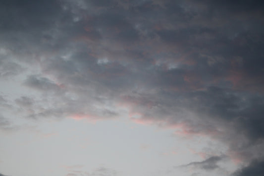 black clouds and blue sky