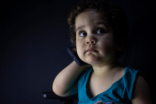 boy in blue tank top
