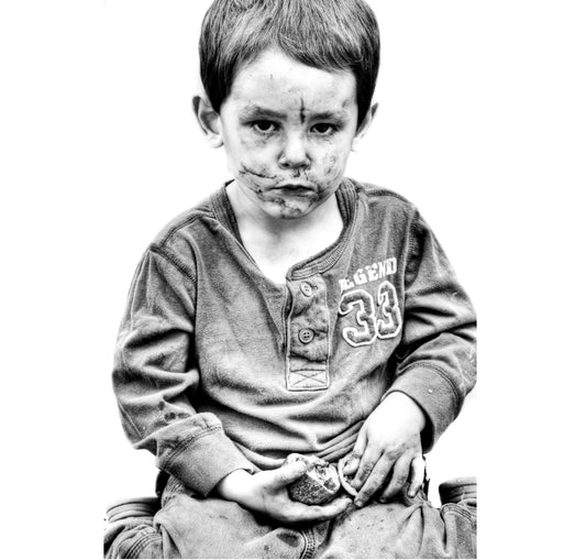 grayscale photo of boy in long sleeve shirt