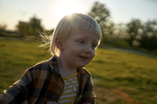 girl in blue white and brown plaid button up shirt
