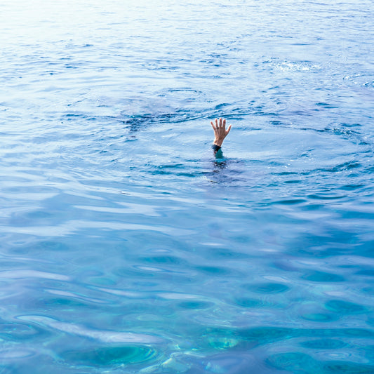 a person swimming in a body of water