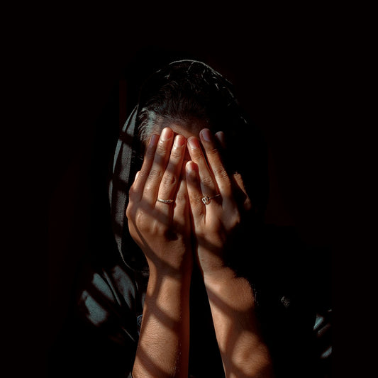 a person holding their hands together