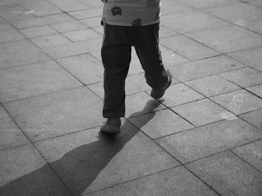 a person's legs and shoes
