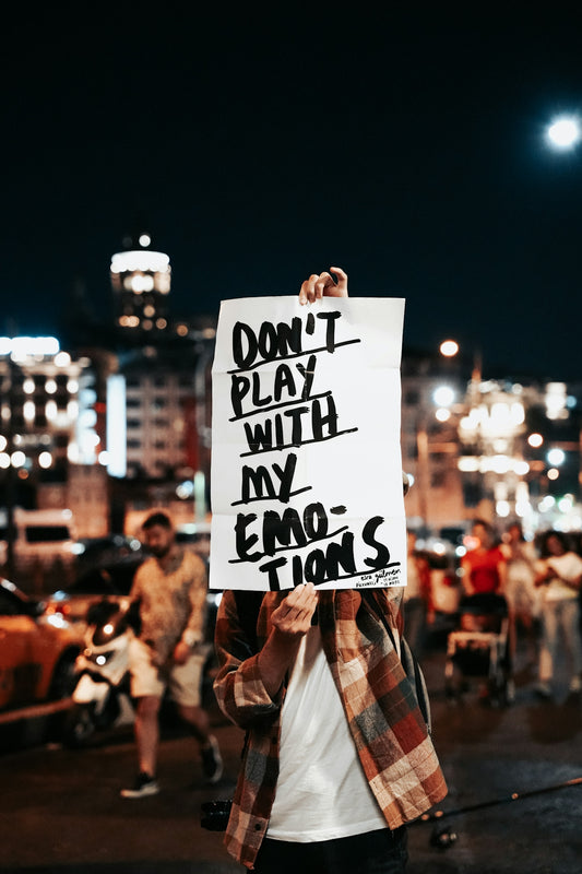 a person holding a sign