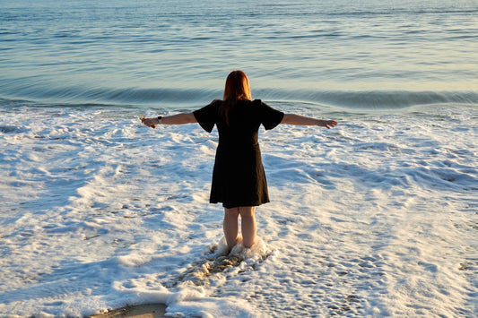 a person standing on a beach