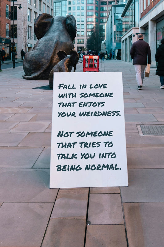 a sign that is on the side of a street
