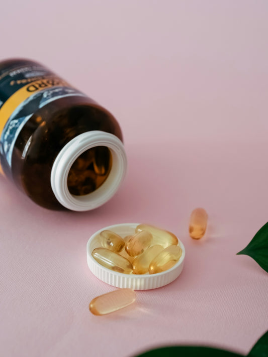 a bottle of pills sitting on top of a table
