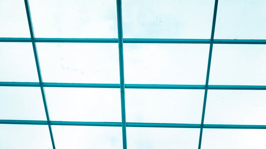 a close up of a ceiling with a sky background