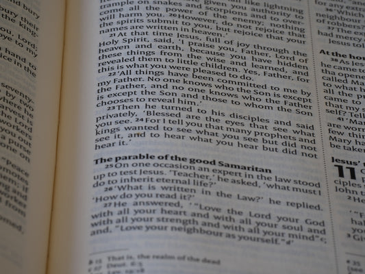 A close up of an open book with text