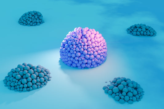 A group of blue balls sitting on top of a blue surface