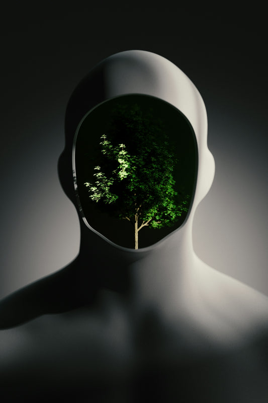 A man's head with a tree in the middle of it