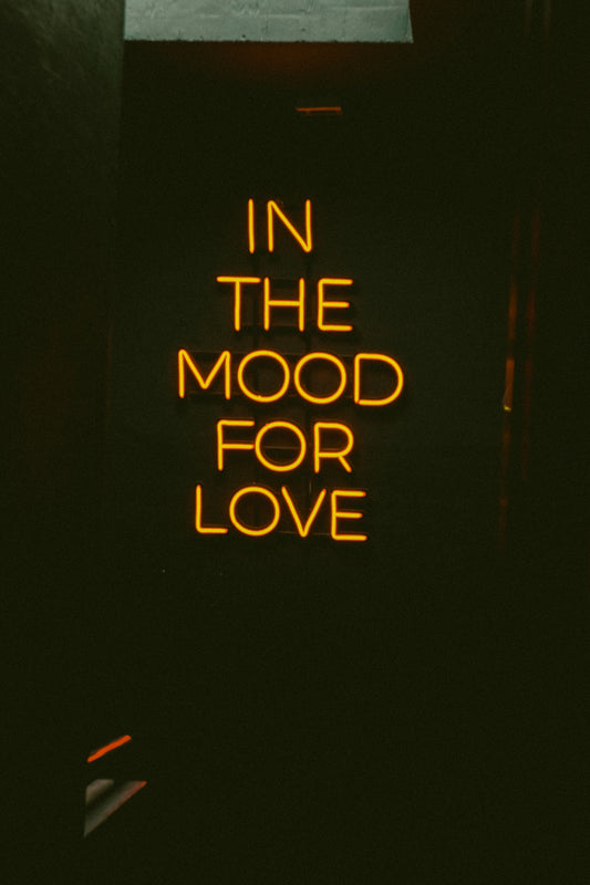 A neon sign that says in the mood for love