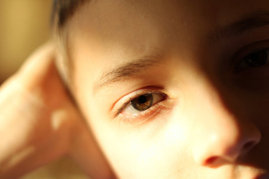 A close up of a person with a cell phone